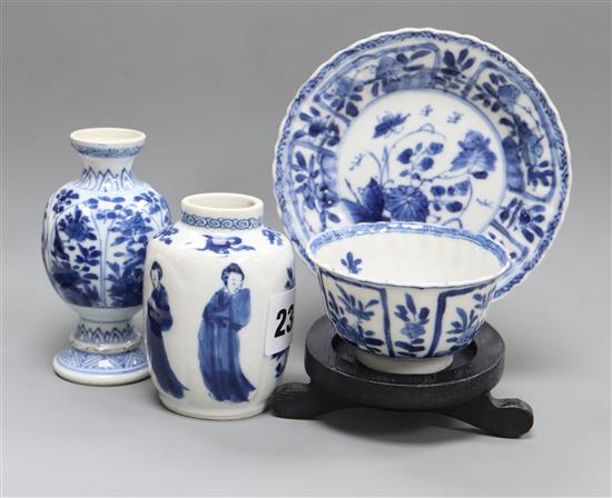 A Chinese blue and white tea bowl and saucer and two jars, Kangxi, some damage, largest diameter 11cm